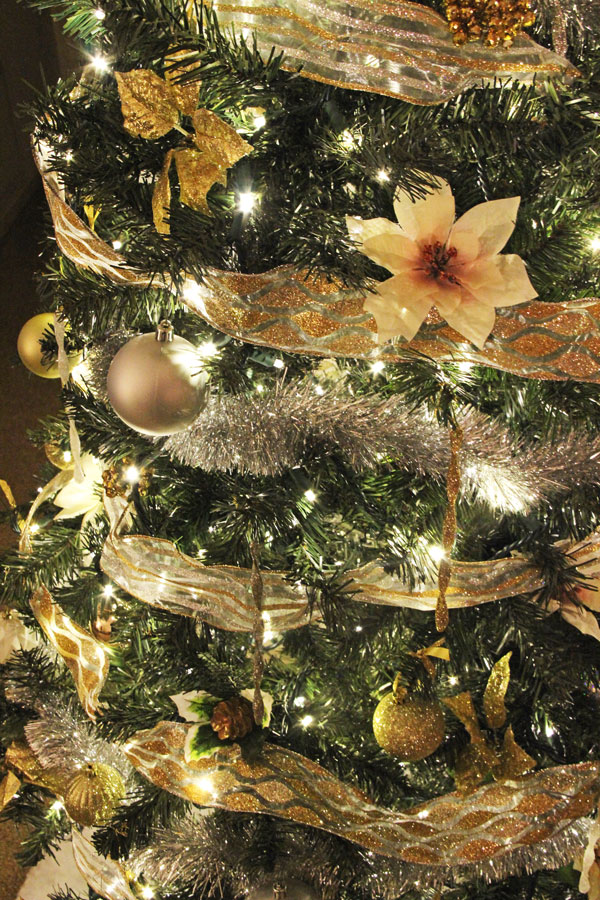 How to Light, Ribbon, and Decorate a Christmas Tree | www.rhapsodyinrooms.com